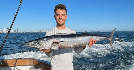 Young anglers wahoo fishing with a nice wahoo